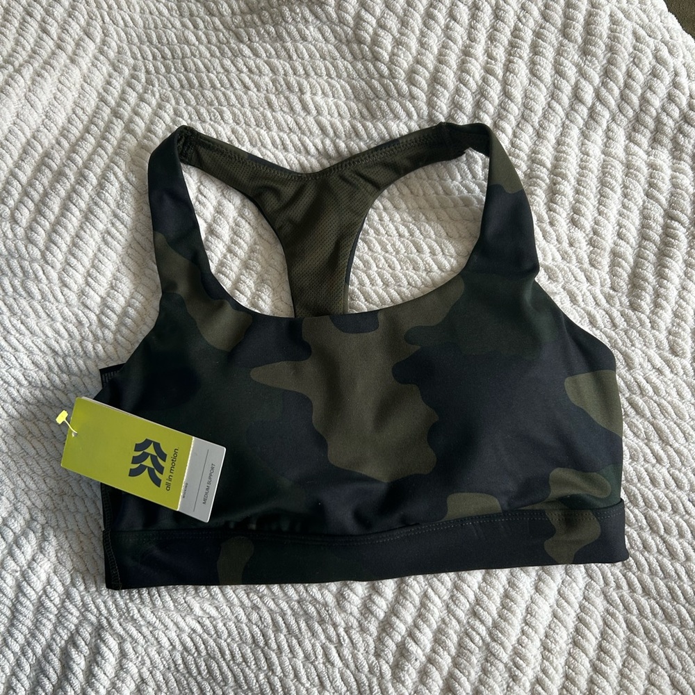 BNWT! All In Motion sportsbra in dark green camo. XS. Lightly padded cups.